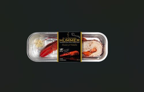 Illustrasjonsbilde - Blanchert halv hummer med hvitløk- og estragonsmør 215 g